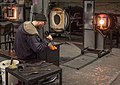 Image 70Glass blower. This was moments before he accidentally dropped it. Heartbreaking (and vasebreaking). Talented folks here, though, and I actually went back a while later and took a class. Got a piece of lit up frozen spaghetti to prove it.