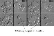 Changes in south pole from 1999 to 2001, as seen by Mars Global Surveyor. Notice how Swiss-cheese type holes have grown in the two years.