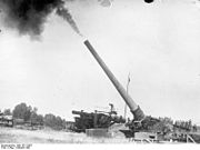 16-inch Navy MkIIMI gun (possibly MkIIIMI) firing on a US Army coast defense mount, 1931. The weapon behind it is on a disappearing carriage.