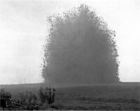 Explosion of the mine beneath Hawthorn Ridge Redoubt on the Western Front during World War I (July 1, 1916). Photo by Ernest Brooks