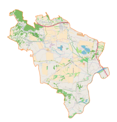 Mapa konturowa gminy Liszki, blisko centrum na lewo u góry znajduje się punkt z opisem „Gaik”