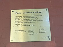 A metal plaque on a wall