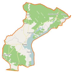 Mapa konturowa gminy Powidz, blisko lewej krawiędzi na dole znajduje się punkt z opisem „33 Baza Lotnicza(21 Baza Lotnicza)”