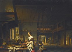 Intérieur de cuisine avec une femme cuisinant et un garçon soufflant sur les flammes