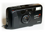 Kompaktkamera Yashica T4 mit Tessar 3,5/35 (ab 1990)