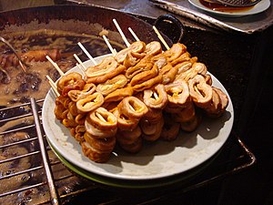 Skewers with rings of pork intestine