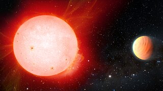 Artist impression of ultra fluffy gas giant planet orbiting a red dwarf star.jpg