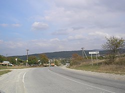 View of the road to Perevalivka with the Crimean Mountains in the background.