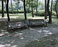 A pair of neglected benches in a public park, South Korea