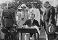 John Pershing watches Coolidge as he signs appropriations for the Veterans Bureau and the 1924 immigration act