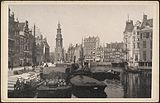 Munttoren en water met schepen rond 1900