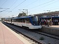 A train arriving at Alsancak station on opening day.