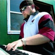 Jeremy Boyer playing organ for the Southeast Missouri State Redhawks.jpg