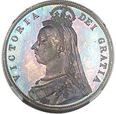 Silver coin with a woman's head on it