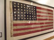 The U.S. flag that flew on the battleship USS Arizona when it sank during the attack on Pearl Harbor. The flag is on display in the first floor of the Arizona State Capitol Museum.
