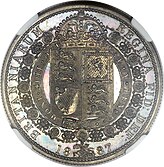 Silver coin with a heraldic shield on it