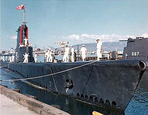 USS Carbonero (SS-337) about to tie up inboard of the Gudgeon (SS-567) at Pearl Harbor, c. 1963.