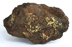 Gold on hematite from the old Dutchman Mine near Bouse[1]