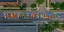 The phrase "Black Lives Matter" painted on a road.