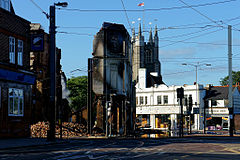 The burned-out store in August 2011