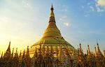 A large gold-plated pagoda and several small ones