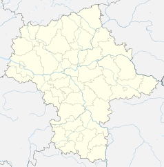Mapa konturowa województwa mazowieckiego, w centrum znajduje się punkt z opisem „Akademia Leona Koźmińskiego w Warszawie”