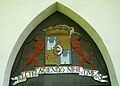 Wedel-Jarlsberg in 19th Century style above an entrance to Sem Church.