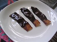 Chocolate-covered bacon, dipped in chocolate ganache