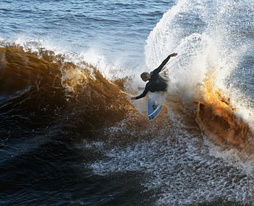 A surfer at the wave