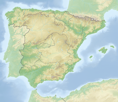 Mapa konturowa Hiszpanii, u góry nieco na prawo znajduje się punkt z opisem „Huesca”