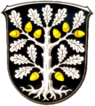 Escudo de Okriftel con roble, bellotas y raíces