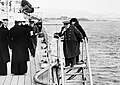 Prime Minister Winston Churchill leaving HMS AJAX to attend a conference ashore. Athens can be seen in the background
