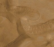Full color image of gullies on wall of Gorgonum Chaos. Image is located in the Phaethontis quadrangle.