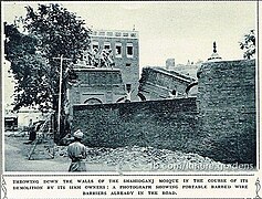 Photograph of the dispute and demolition of the Shaheed Ganj Mosque in Lahore - throwing down the walls of the mosque in the course of its demolition.jpg