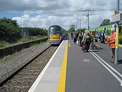 An Intercity train towards Dublin and a Commuter shuttle to Balina