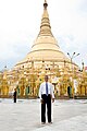 Image 14Former US President Barack Obama poses barefoot on the grounds of Shwedagon Pagoda, one of Myanmar's major Buddhist pilgrimage sites. (from Culture of Myanmar)