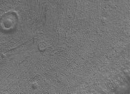 Close up image of Phaethontis surface taken by Mars Global Surveyor, under MOC Public Targeting Program. Pits are thought to be caused by buried ice turning into a gas.