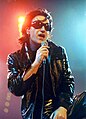 Bono as his alter-ego "The Fly" in 1992. He conceived this character during the band's sessions in Dublin