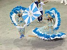 Casal de mestre-sala e porta-bandeira da escola de samba Unidos de Vila Isabel, no carnaval de 2006.