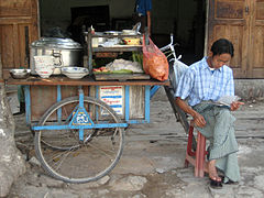Mohinga is available all day from pavement stalls such as this in Mandalay.