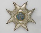 Äldre broderad kraschan, buren av Fredrik II av Preussen, återsänd till Sverige vid dennes död 1787.