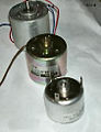Three other small DC electric motors.