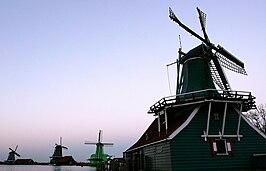 De Huisman en zijn buurmolens bij zonsondergang, 2006