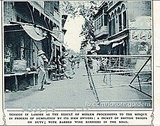 Photograph of the dispute and demolition of the Shaheed Ganj Mosque in Lahore - picket of British troops guarding roads prepared with barbed wire.jpg