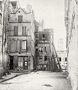 La rue du Marché aux fleurs en la Ile de la Cité, antes de Haussmann, hoy plaza Louis-Lépine