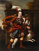 Portrait of a young boy as a hunter with his King Charles Spaniel