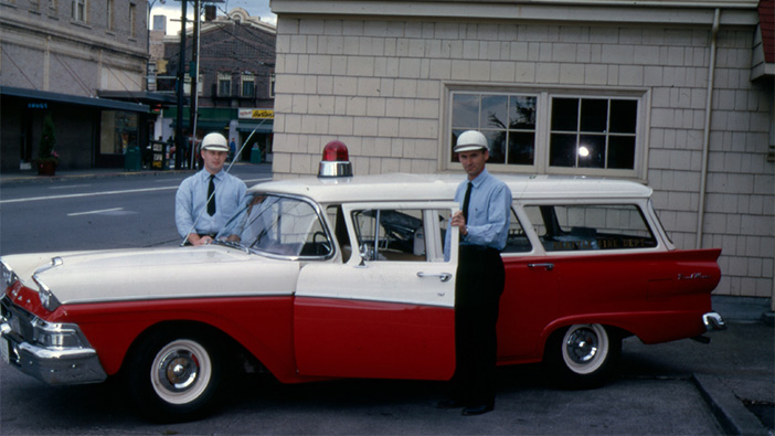 Archived photograph of a Medic One ambulance and EMTs