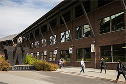 Photograph of students walking through the center of the UW Bothell campus.