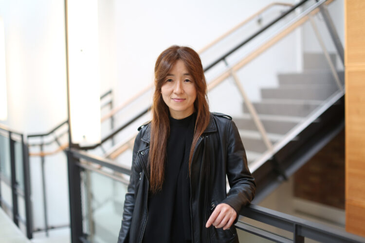 Yejin Choi person stands in front of a stairwell