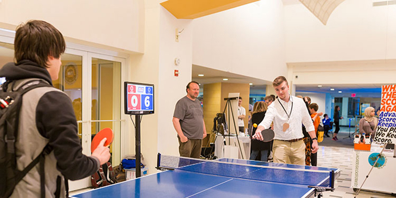 Students playing ping pong